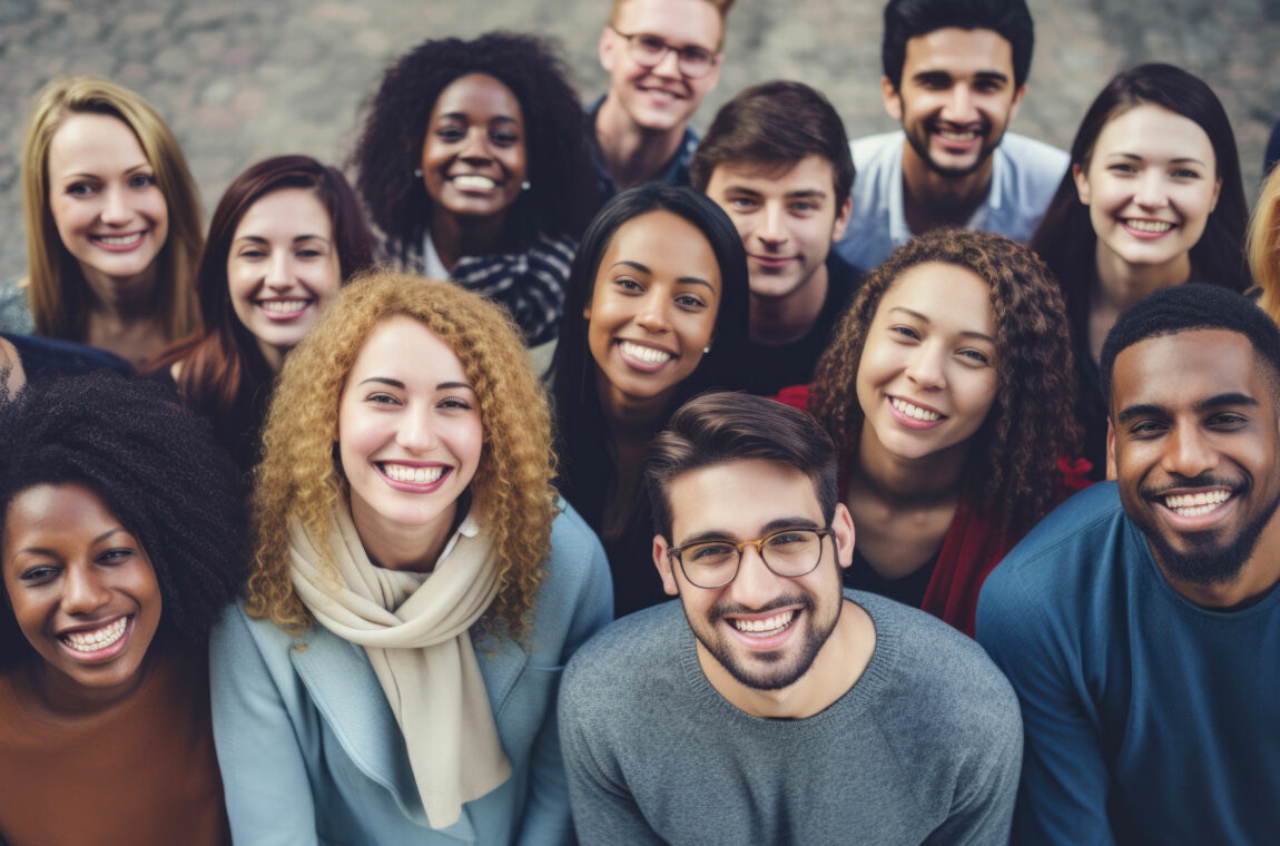 Group of happy students looking at the camera and smiling